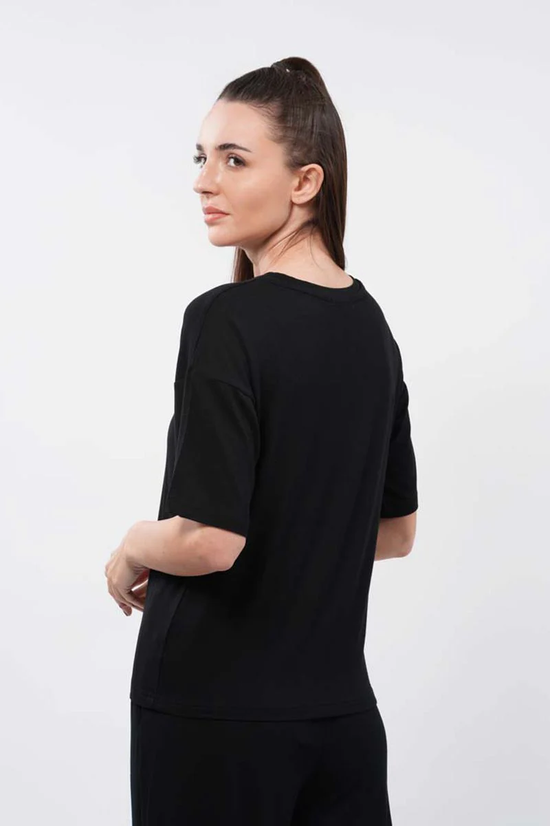 بلوزة نسائية للبيت بلون موحد - Image 8